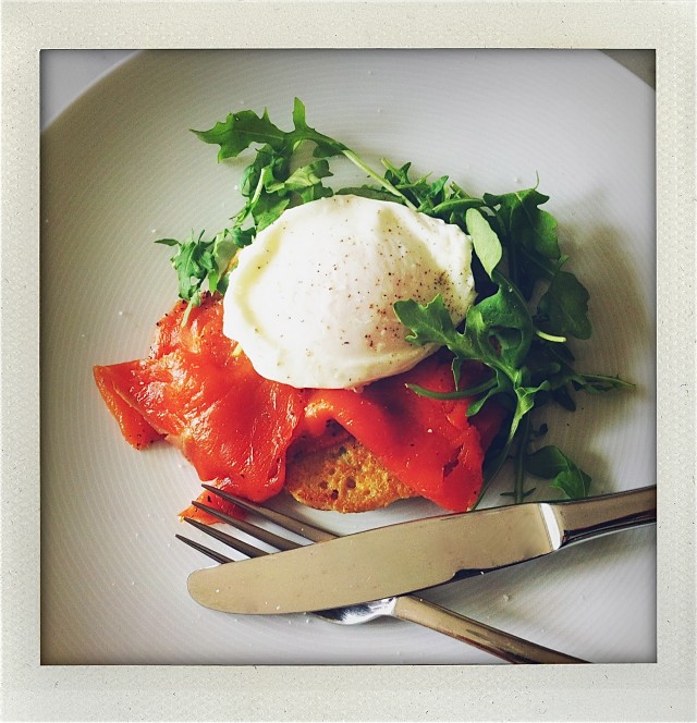 Couscous patty with gravlax and a poached egg