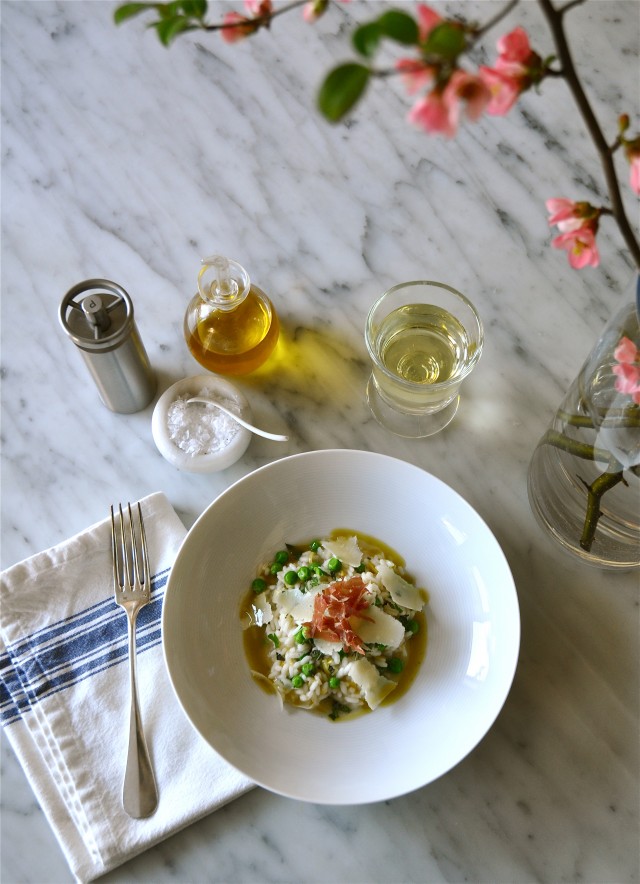 Pea risotto with prosciutto and basil oil